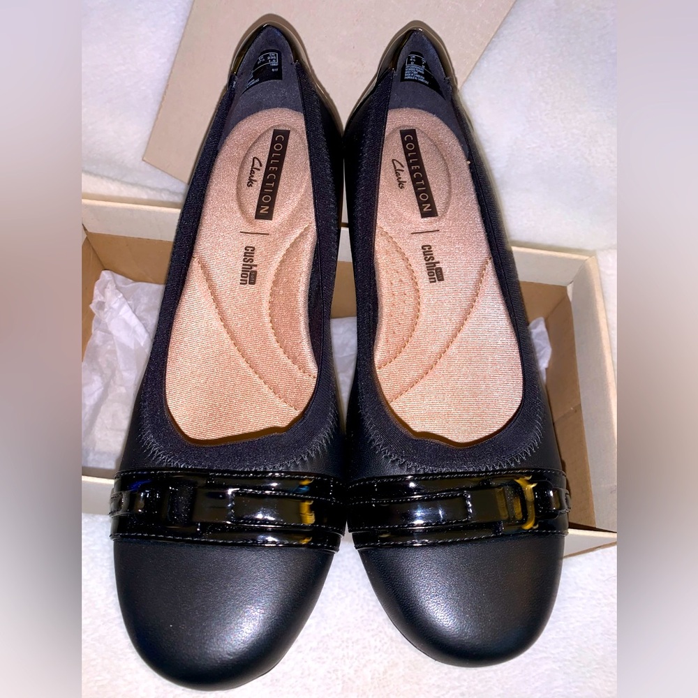 Clarks woman’s Slip on shoes super comfortable brand new in box.